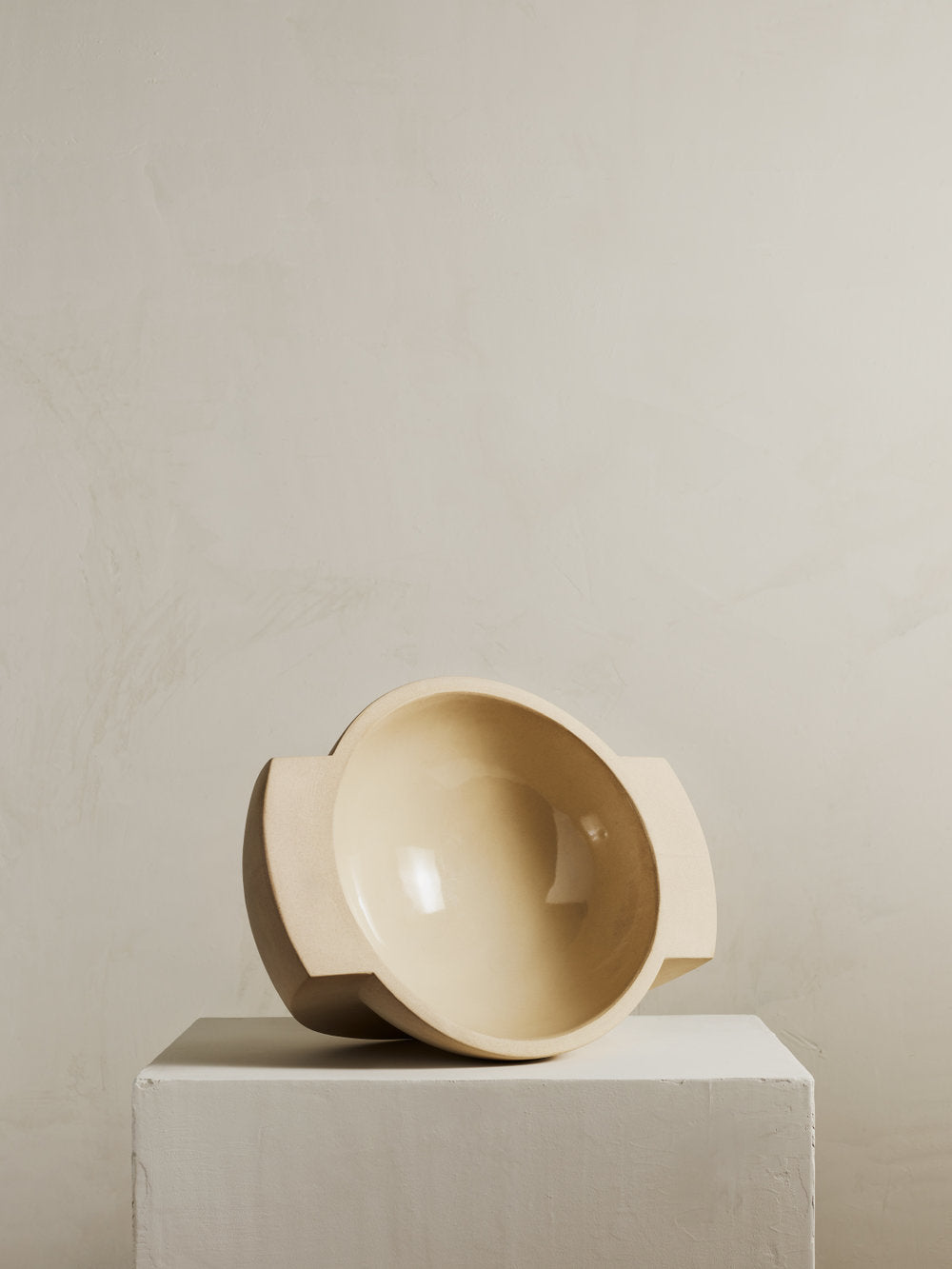Saturn Bowl in warm sandy stoneware and clear glazed interior